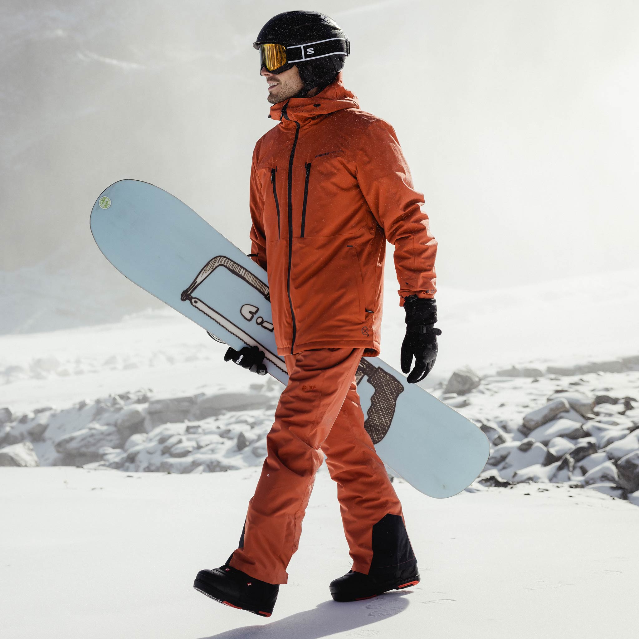 Two snowboarders