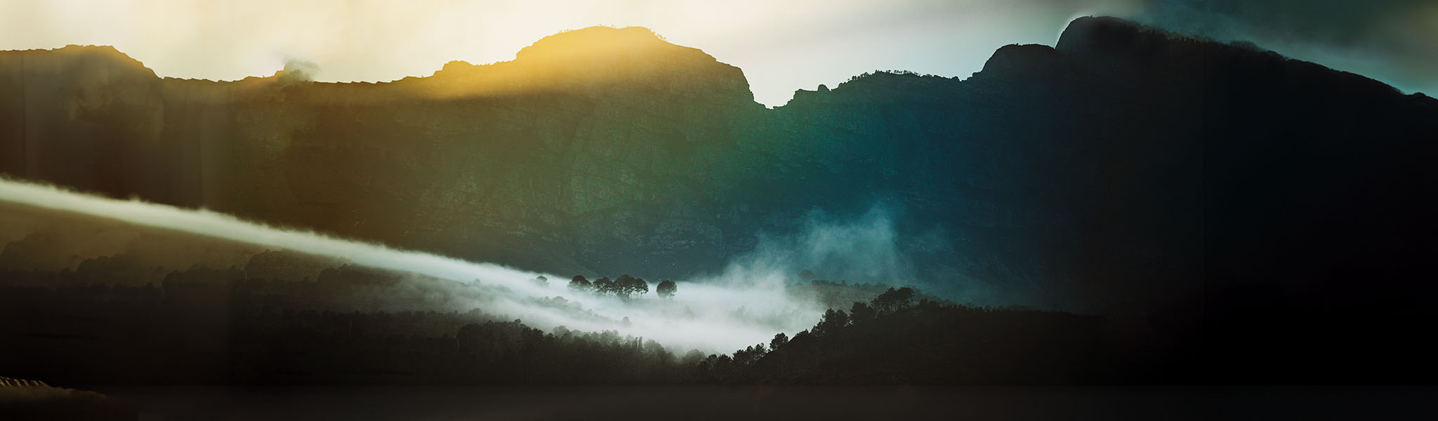 Sustainability report. An image of a misty mountain