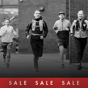 Shop running sale. A group of runners on the road