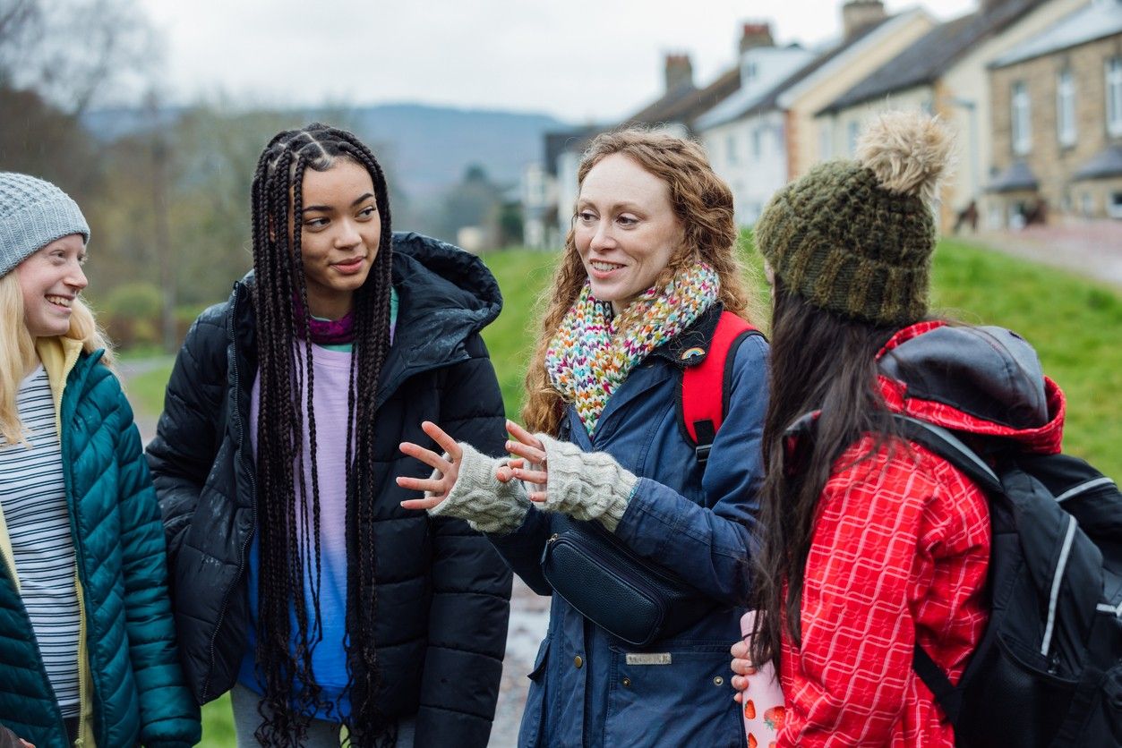 Young girls talking during a youth expedition