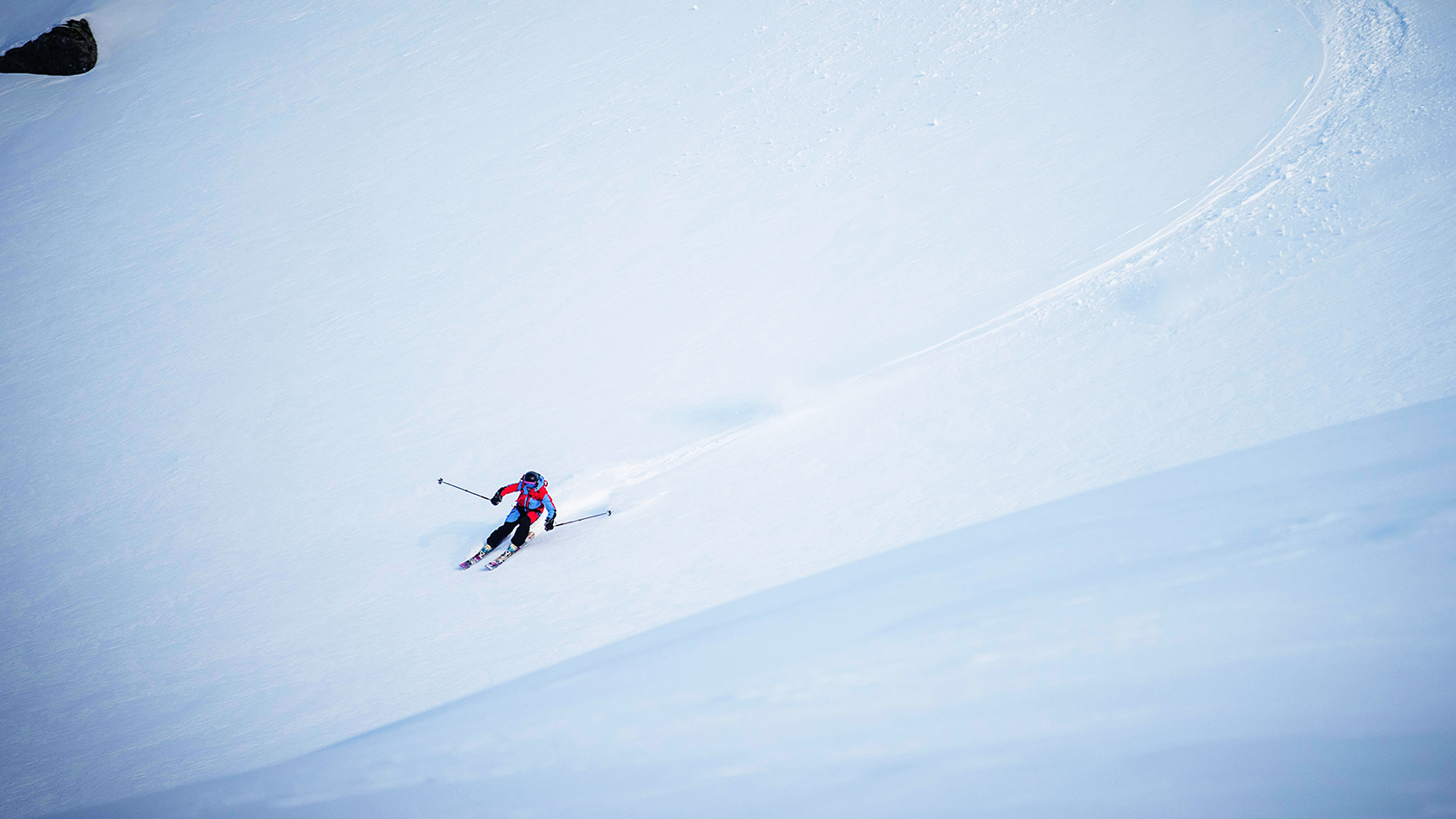 A person alpine skiing 