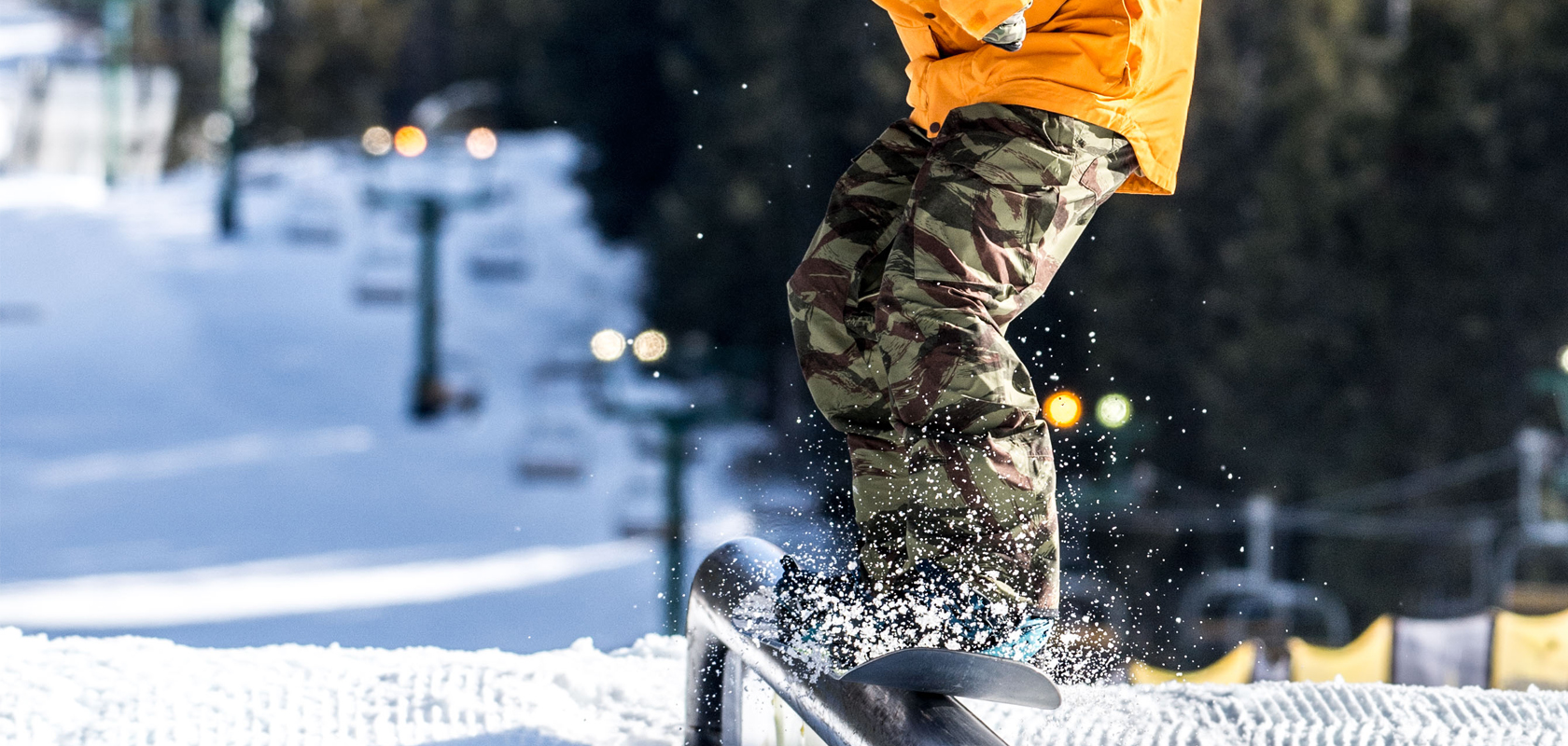 Two snowboarders