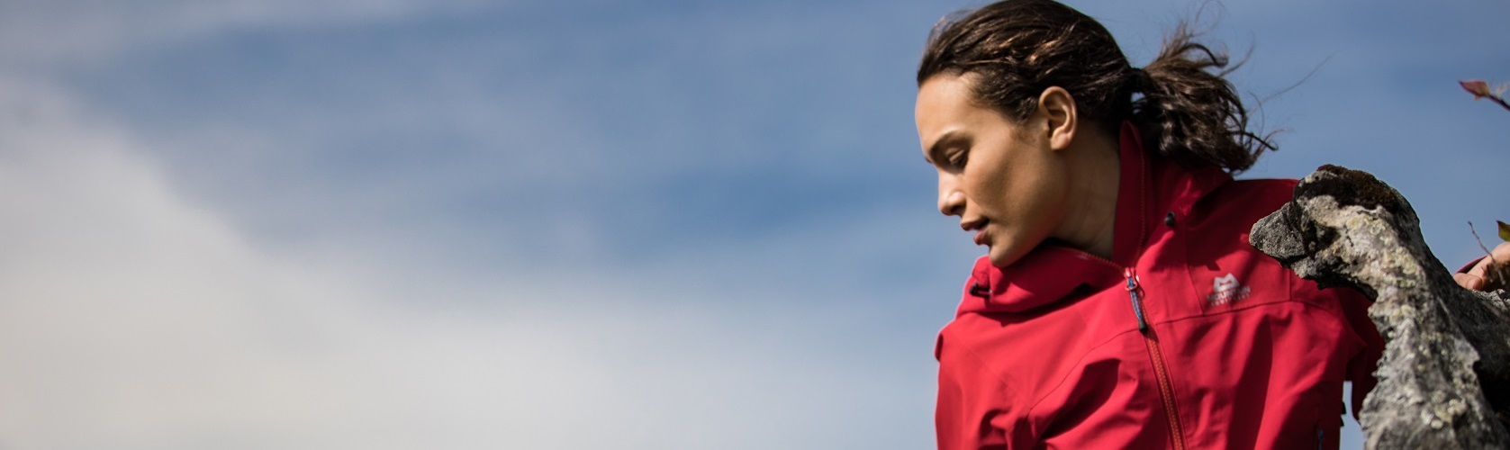 An image of a woman wearing a Mountain Equipment waterproof jacket 