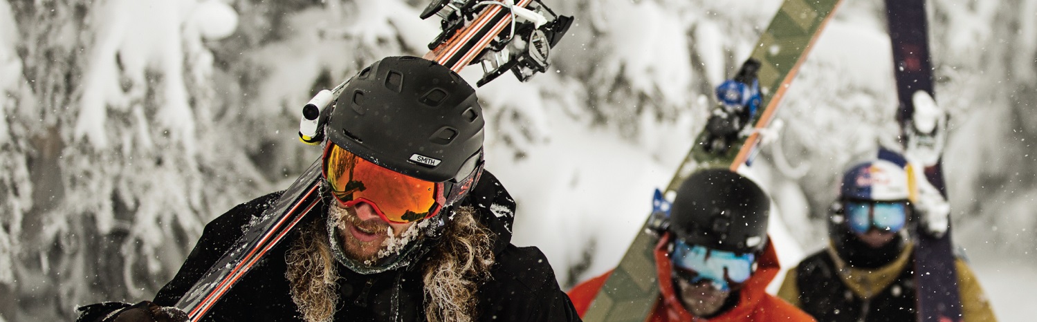 A group of people wearing Smith ski helmets 
