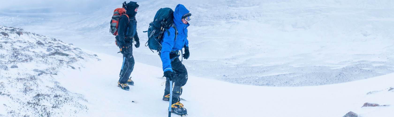 Two people winter mountaineering 