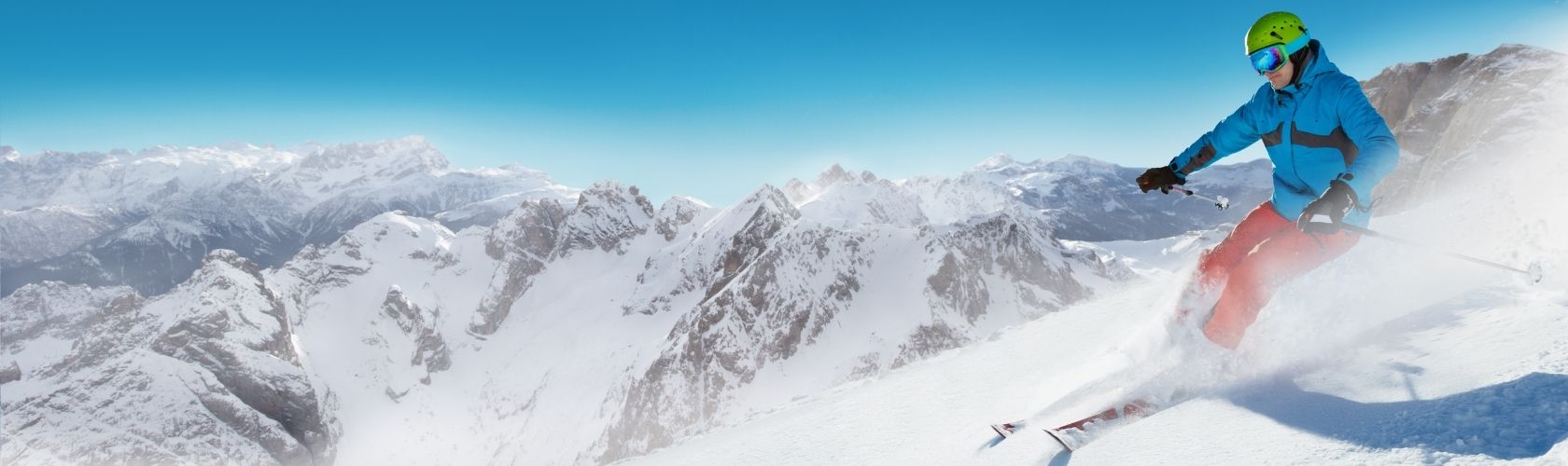 A person skiing down the slopes 