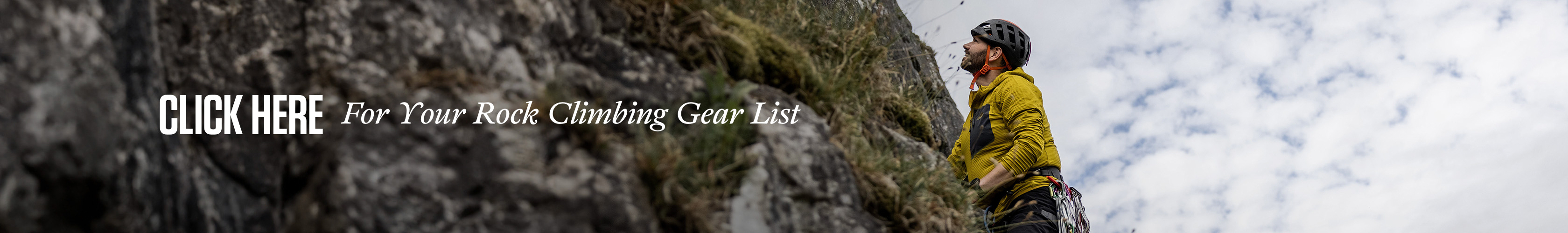 Click here for your rock climbing gear list. A man climbing a rock 