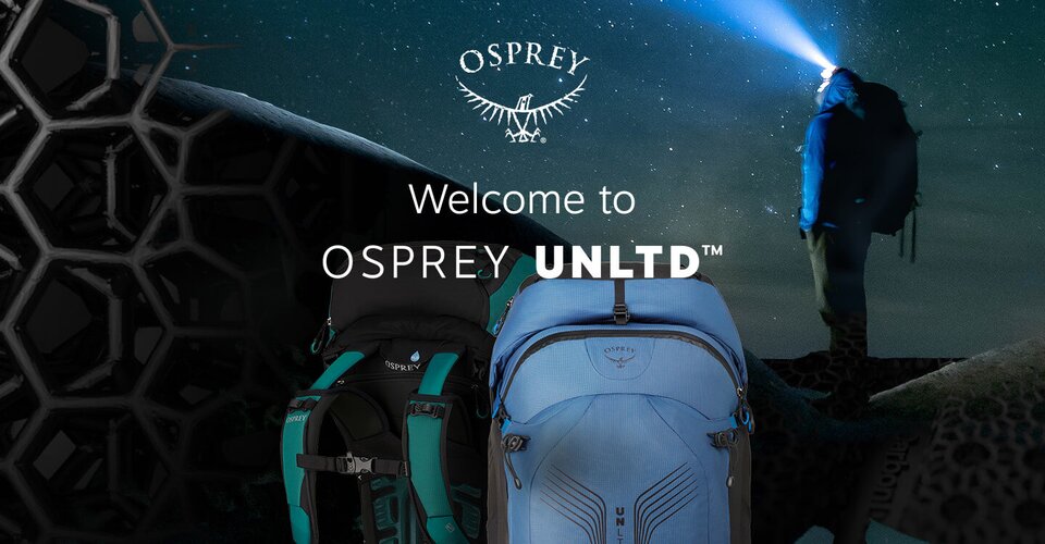 A couple with Osprey backpacks packing up after camping in rocky mountains