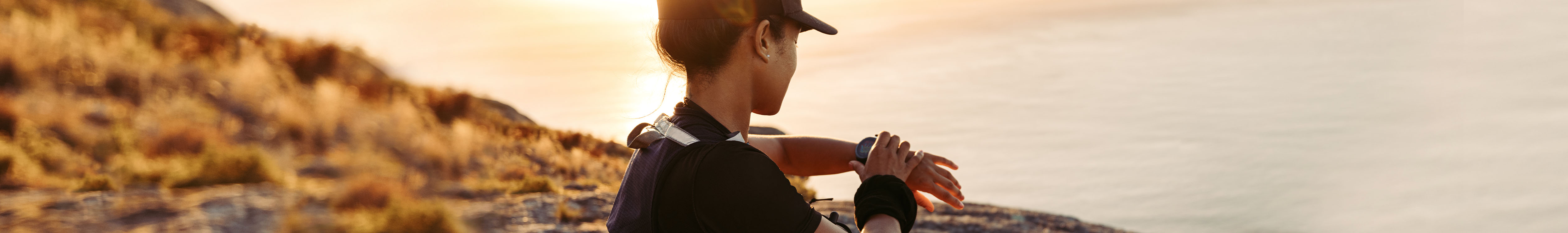 Electronics new season SS23. A person looking at the watch 