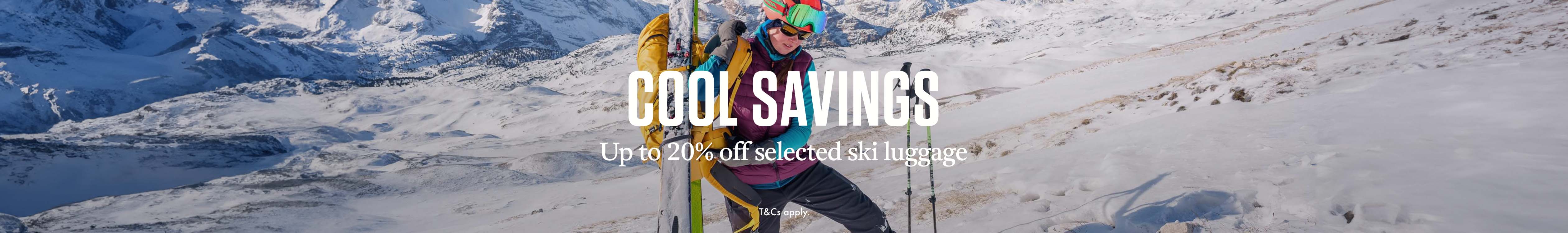 Cool Savings. Up to 20% off selected ski luggage. A person using a ski pack to carry her skis up the snowy mountain