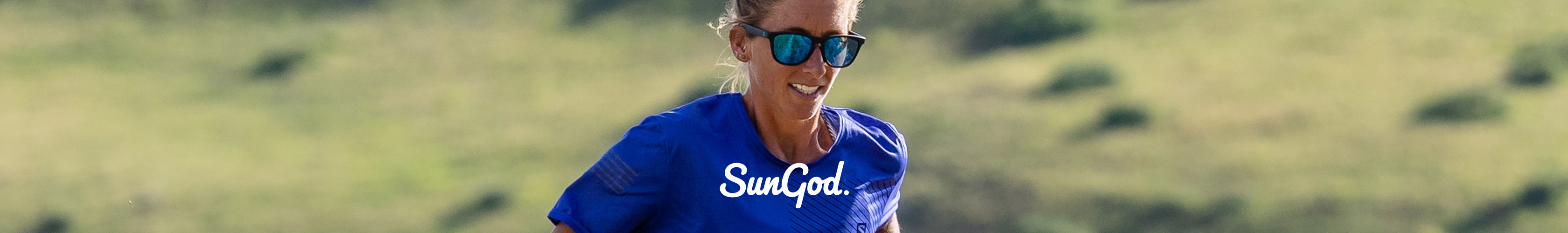 Shop SunGod sunglasses, A woman in blue T-shirt wearing SunGod sunglasses
