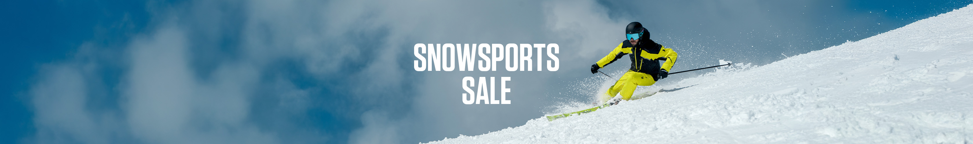 Shop snowsport sale. A skiier skiing down the mountain