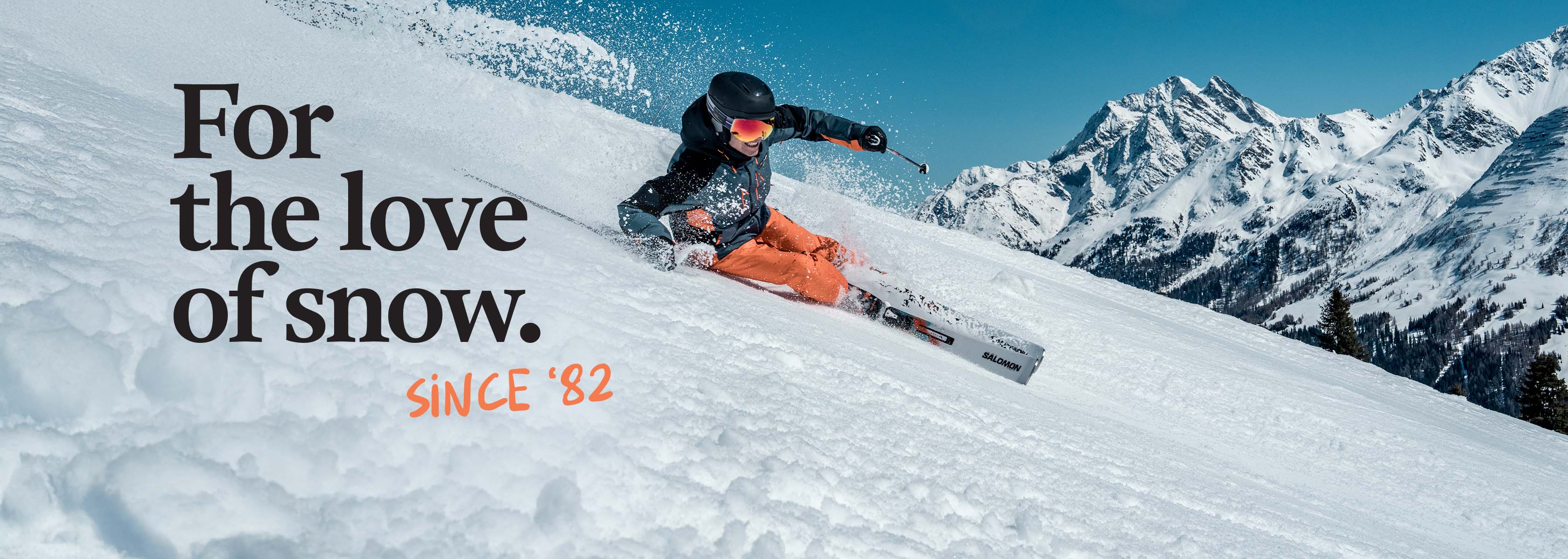 Shop Snowsport new season - For the love of snow since 1982. A man skiing down the mountain