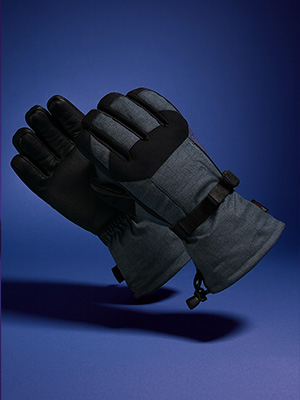 Shop ski accessories. A black ski gloves on blue background
