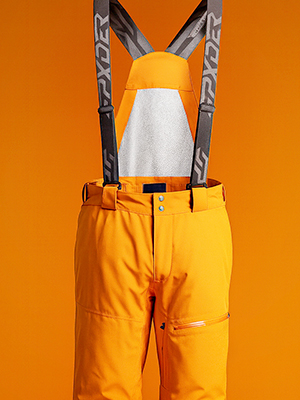 Shop ski pants. An orange ski pants on orange background