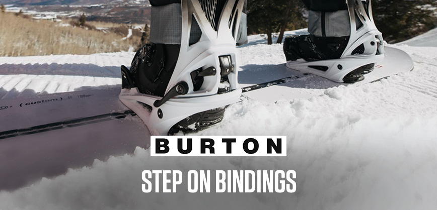 Shop snowboard new season. Two people snowboarding down the mountain
