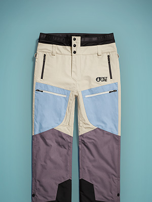 Shop ski pants. An orange ski pants on orange background