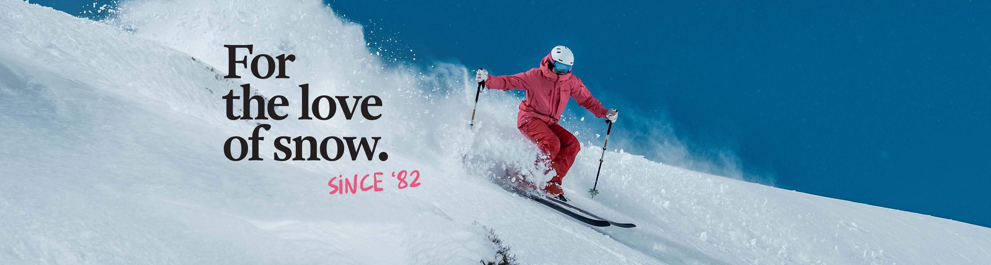 Shop Snowsport new season - For the love of snow since 1982. A man skiing down the mountain