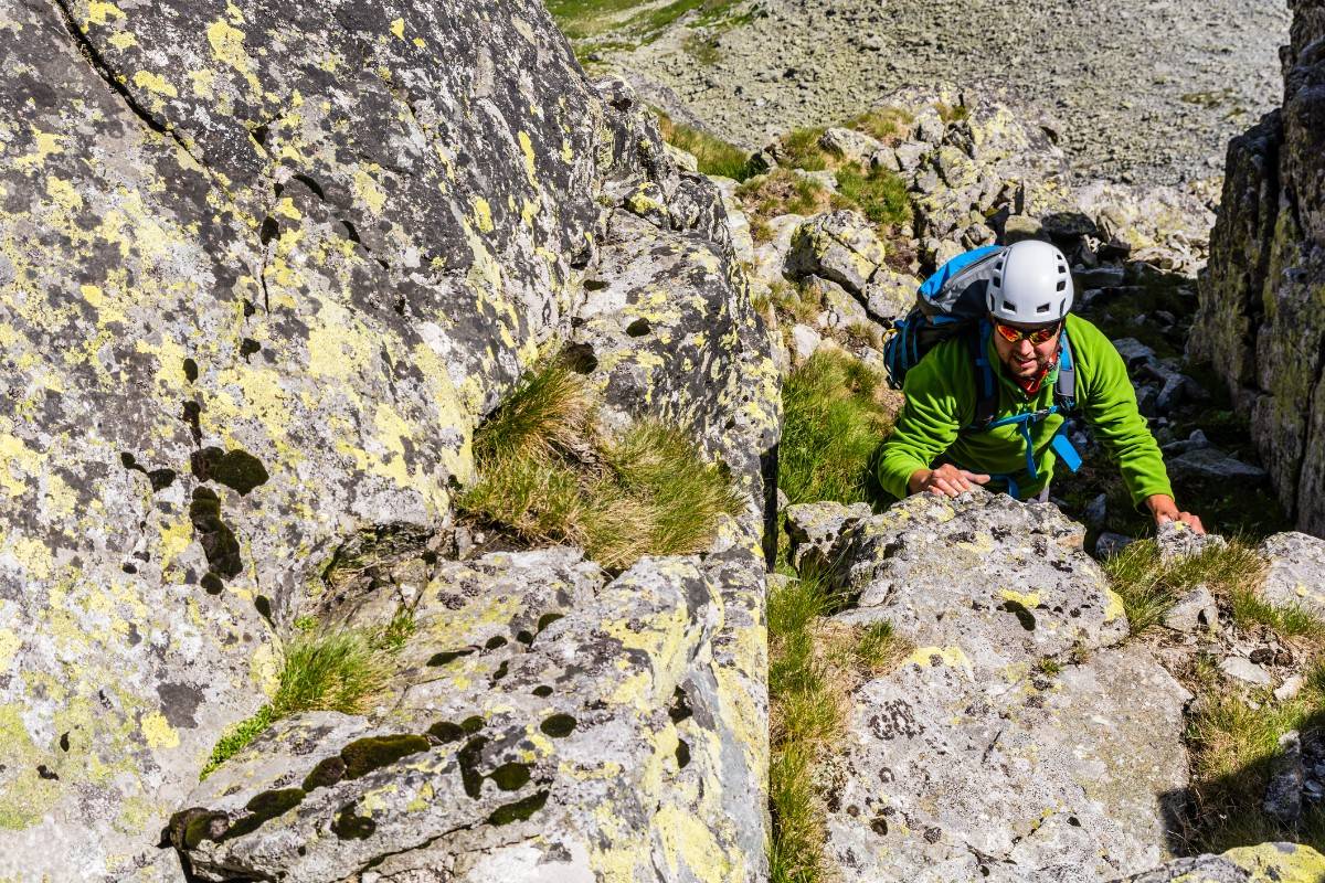 A man rock climbing on Ben Nevis