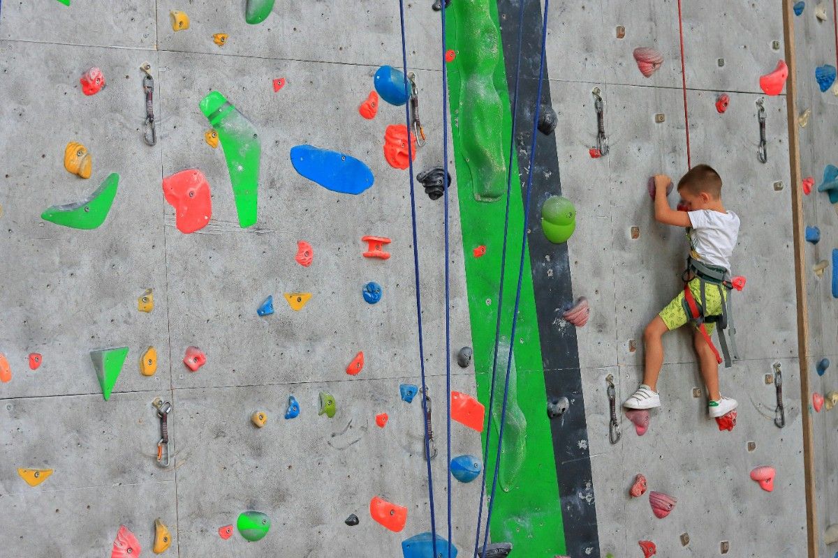 A child on a climbing wall 