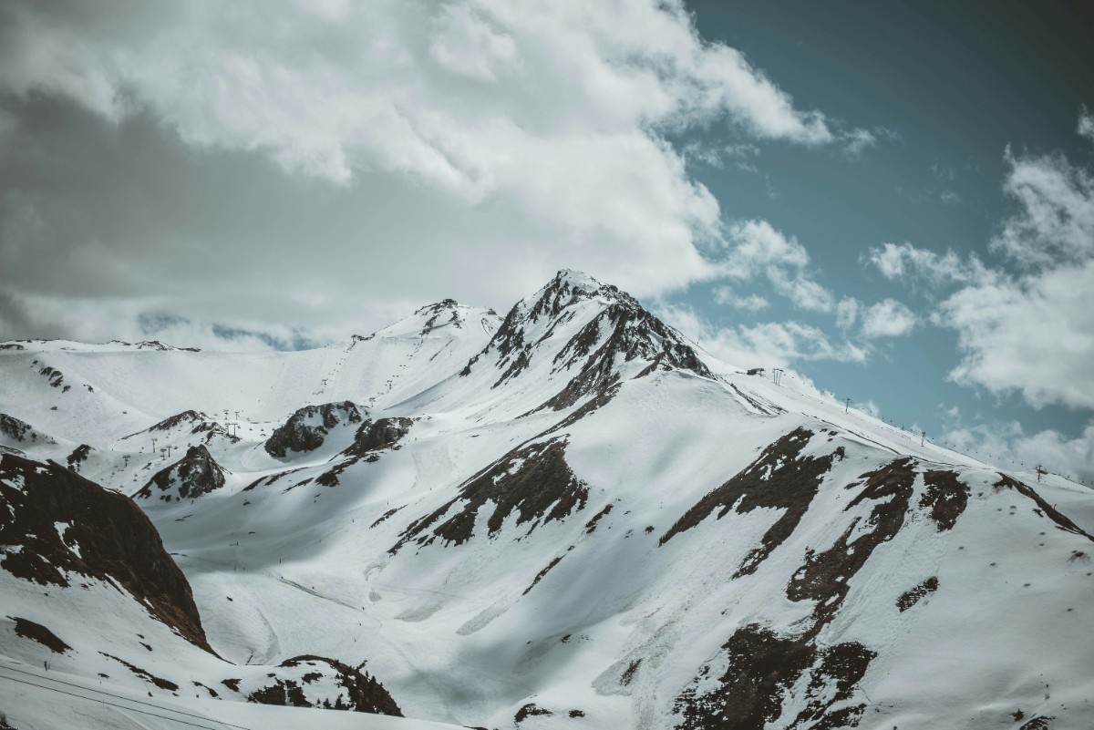 The mountains in Ischgl ski resort with a chair lift in the distance 