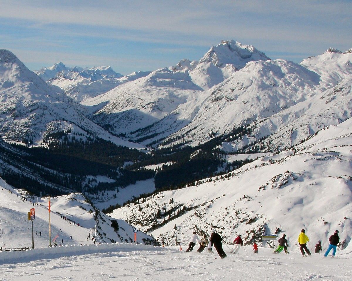 People skiing on the piste in Lech, Austria 
