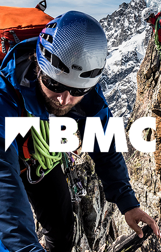 The BMC- person walking on top of mountain
